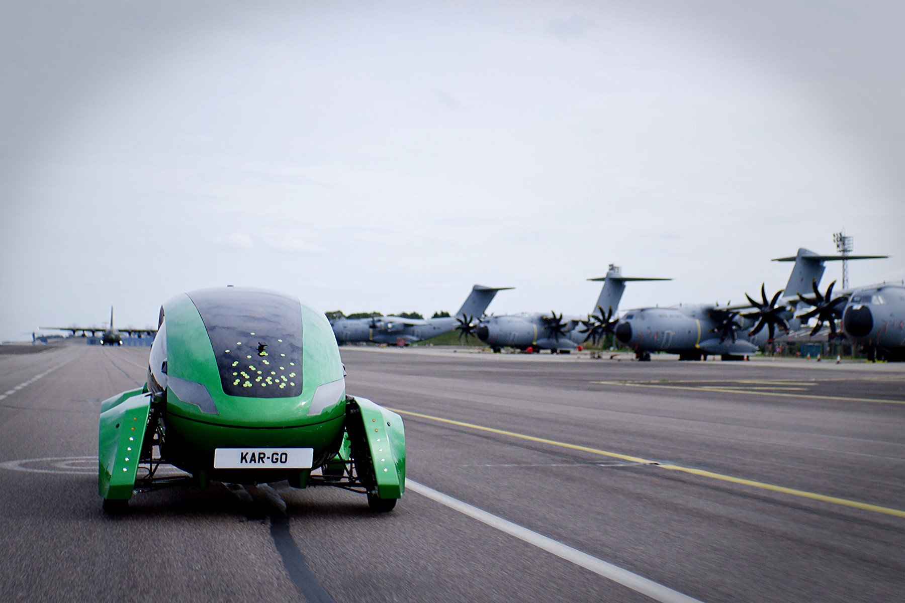 Robot car on the airfield, with Atlas Aircraft lined up.